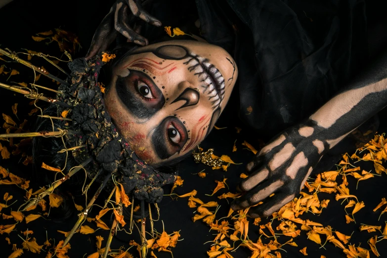a close up of a person laying on a bed of flowers, a portrait, pexels contest winner, vanitas, horror animatronic, avatar image, tibetan skeleton dancer, covered in leaves