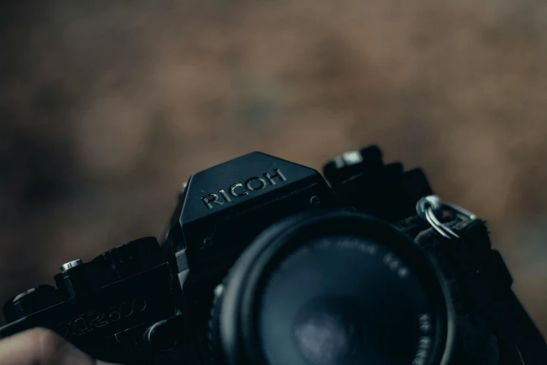 a close up of a person holding a camera, shot on nicon camera, photography], icon, hd 35mm photography