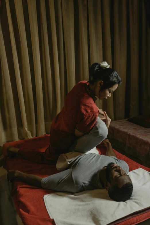 a man laying on top of a bed next to a woman, by Basuki Abdullah, pexels contest winner, renaissance, serving body, gif, bangkok, ( ( theatrical ) )