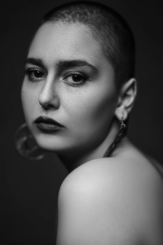 a black and white photo of a woman with a shaved head, a black and white photo, pexels contest winner, girl with a pearl earringl, florence pugh, nika maisuradze, ((portrait))