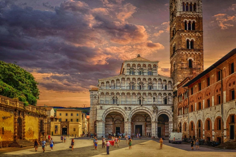 a group of people that are standing in front of a building, by Carlo Martini, pexels contest winner, romanesque, panoramic, square, dappled in evening light, multi - layer