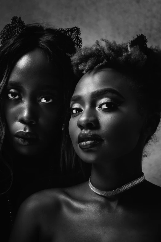 two women standing next to each other in black and white, an album cover, unsplash contest winner, afrofuturism, square, dark black porcelain skin, loish |, gorgeous faces