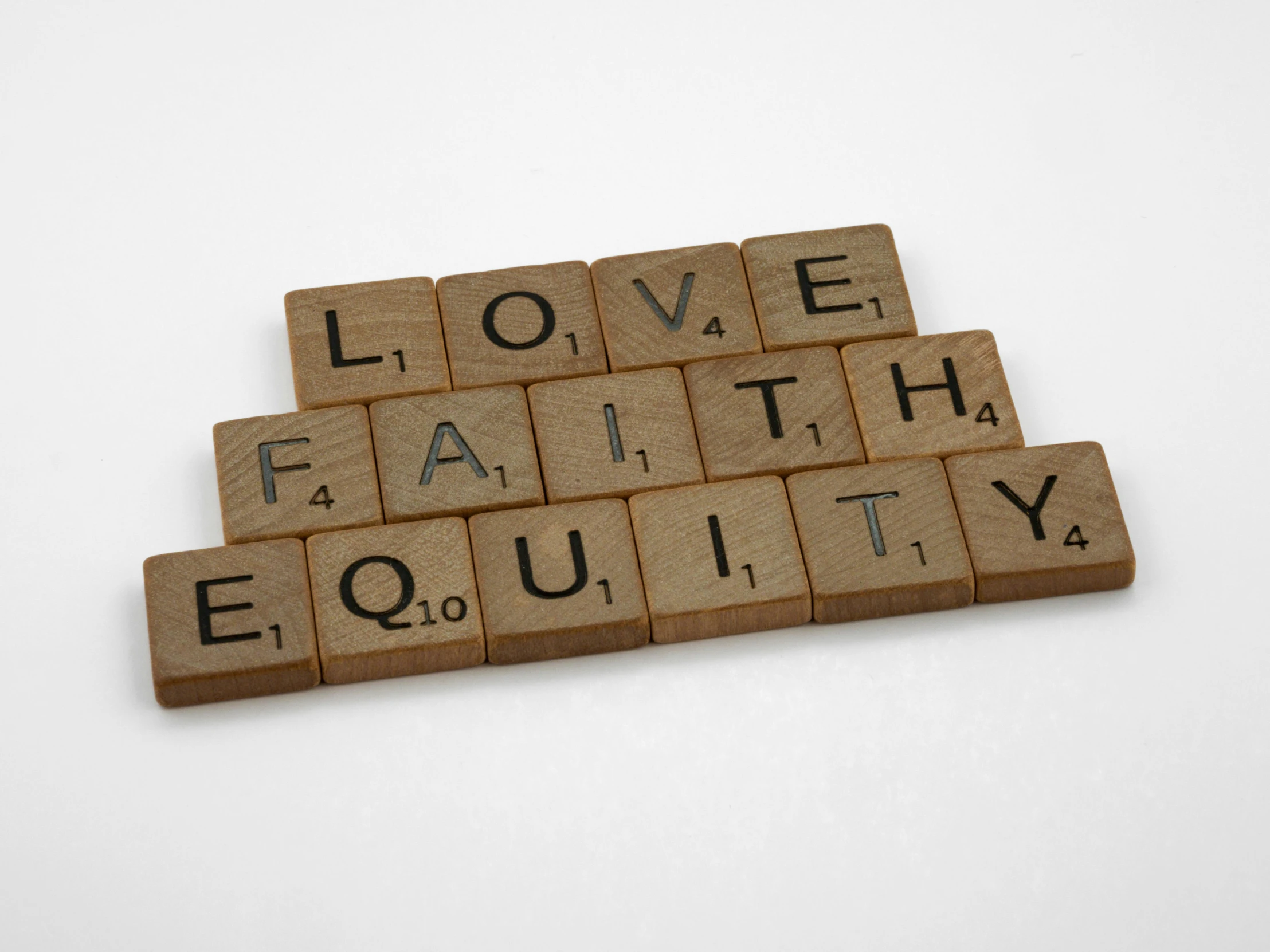 wooden scrabbles spelling love, faith and equity, an album cover, by Edward Clark, unsplash, square, 1 8, ( 3 1, multi-part