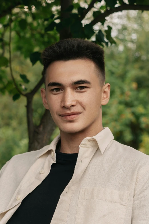 a man sitting on a bench next to a tree, square masculine facial features, azamat khairov, he is about 20 years old | short, 15081959 21121991 01012000 4k