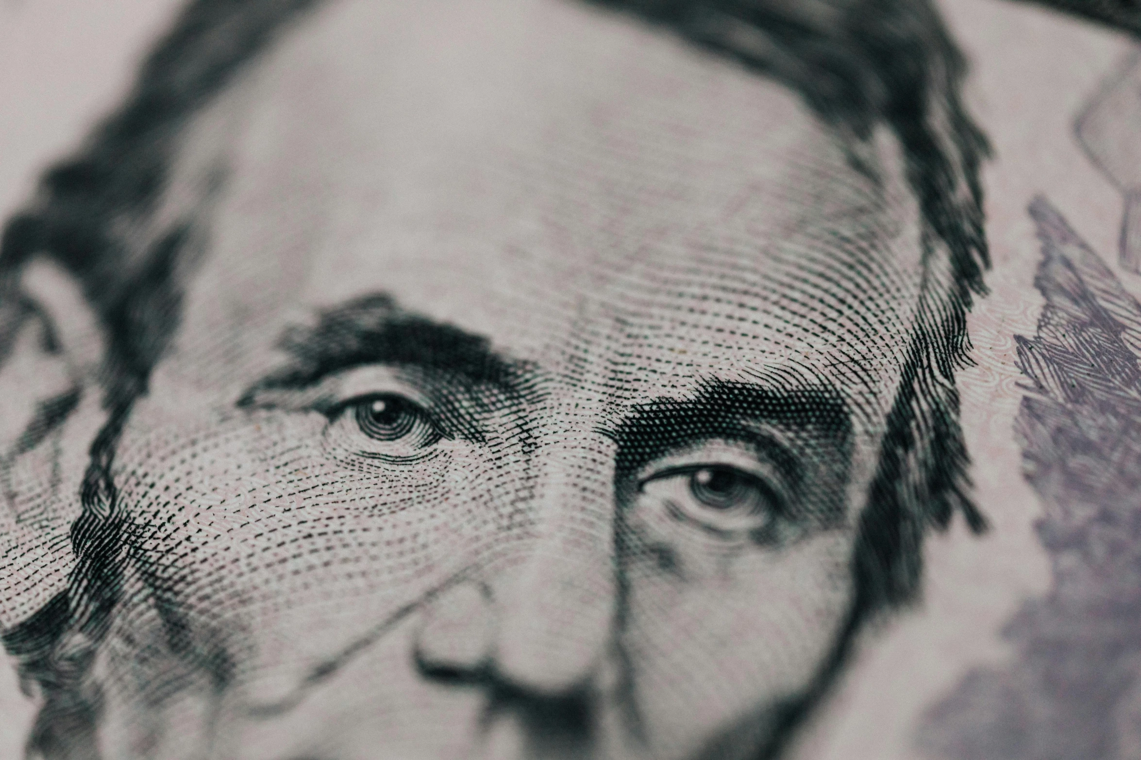 a close up of a bill with a man's face on it, a stipple, trending on unsplash, photorealism, abraham lincoln, promo image, johnny cash, george w bush