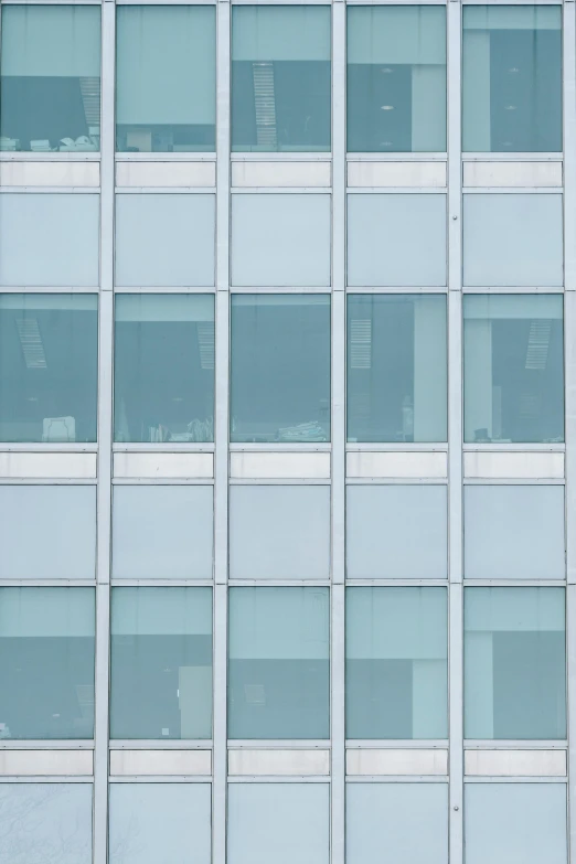 a red fire hydrant sitting in front of a tall building, inspired by Andreas Gursky, unsplash, modernism, pastel blue, glass texture, many windows, white panels