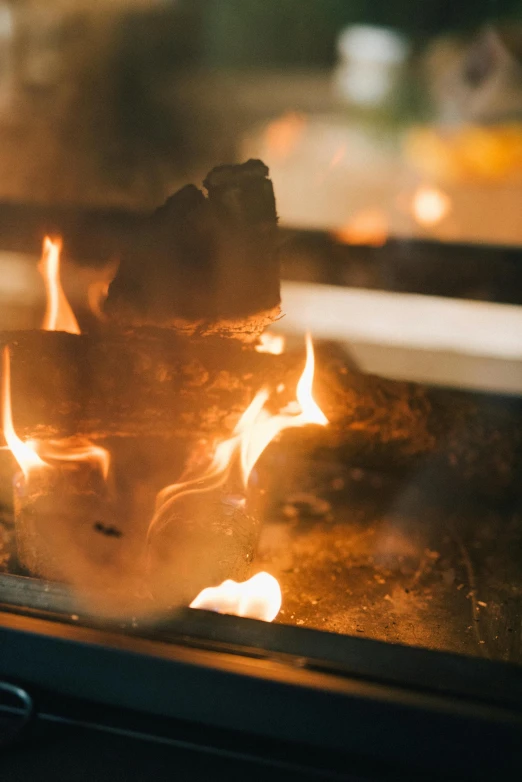 a close up of a fire in an oven, smouldering charred timber, an award winning masterpiece, rituals, vivid