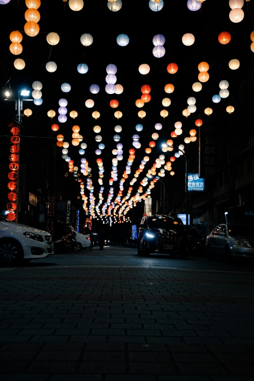 a city street filled with lots of colorful lights, chinese style, with a black background, 2019 trending photo, square