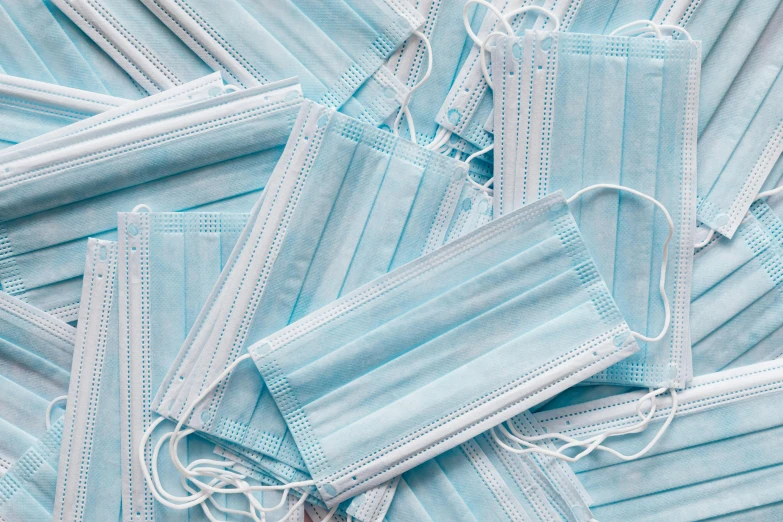 a pile of surgical masks laying on top of each other, an album cover, pexels, light blues, rectangle, 4 0 0 0 0 0, pattern