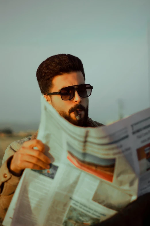 a man reading a newspaper while sitting on a bench, an album cover, pexels contest winner, anchor goatee, sayem reza, television sunglasses, gif