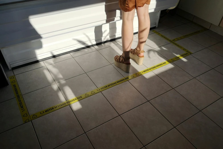a woman standing in front of a refrigerator in a kitchen, hyperrealism, sandals, police tape, photo for a store, square lines