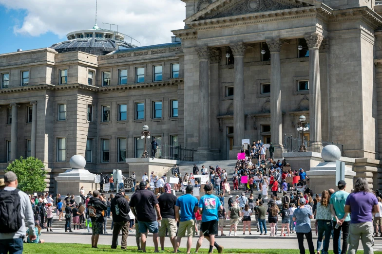 a crowd of people standing in front of a large building, yeg, capitol riot, summer day, 2022 photograph