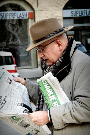 a man reading a newspaper on a city street, inspired by Henri Cartier-Bresson, pexels contest winner, green hat, bald man, paparazzi photo, hunting