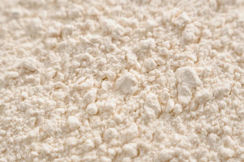 a pile of flour sitting on top of a table, detailed product image, detail shot, porcelain organic, pearlized