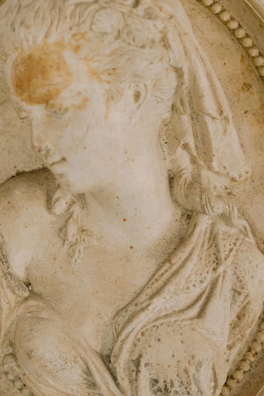 a close up of a coin with a woman holding a baby, a marble sculpture, by Luca della Robbia, trending on pexels, renaissance, weathered drawing, portrait en buste, allegory of metamorphosis, made of marble