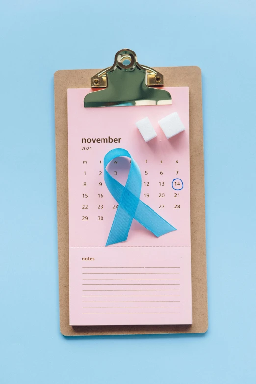 a clipboard with a blue ribbon on it, by Ellen Gallagher, trending on reddit, happening, pink and teal, photograph credit: ap, female calendar, diagnostics
