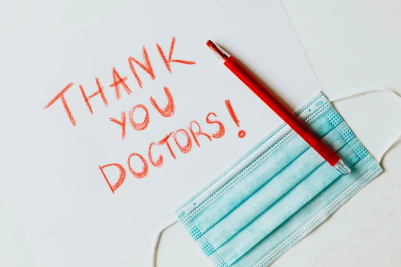 a note with the words thank you doctors written on it, a picture, by Elaine Hamilton, shutterstock, local heroes, maroon, cast, schools