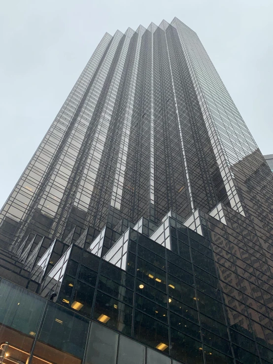 a very tall building with a lot of windows, trump, slightly foggy, photo taken in 2018, fan favorite