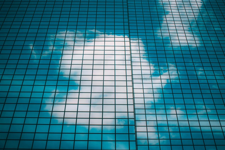 the reflection of clouds in the glass of a building, inspired by Rene Magritte, unsplash, f 1.4 kodak portra, vertical composition, fuji pro 400h, tokio