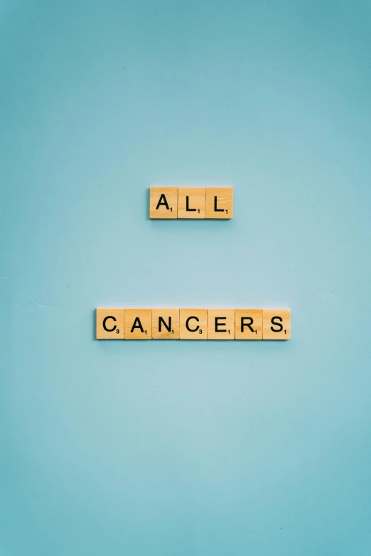 the words cancer spelled in scrabbles on a blue background, an album cover, by Ellen Gallagher, shutterstock, renaissance, 144x144 canvas, benefit of all, alessio albi, a green