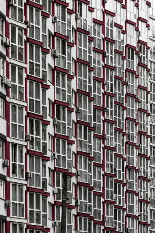 a very tall building with lots of windows, inspired by Andreas Gursky, unsplash contest winner, wine-red and grey trim, soviet suburbs, фото девушка курит, panels