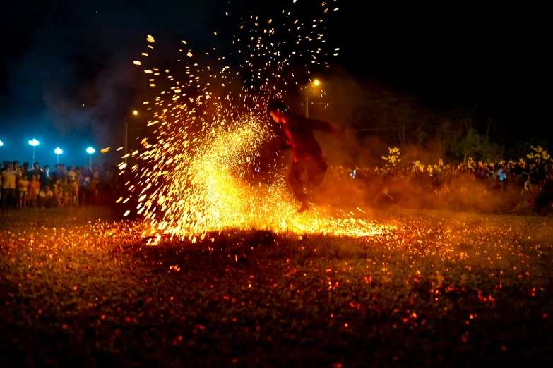 a man that is standing in the grass with a fire, pexels contest winner, auto-destructive art, firework, avatar image, blessing the soil at night, mid shot photo