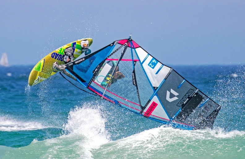 a person windsurfing in the ocean on a sunny day, by Emanuel Witz, pexels contest winner, avatar image, graphic print, canines sports photo, thumbnail