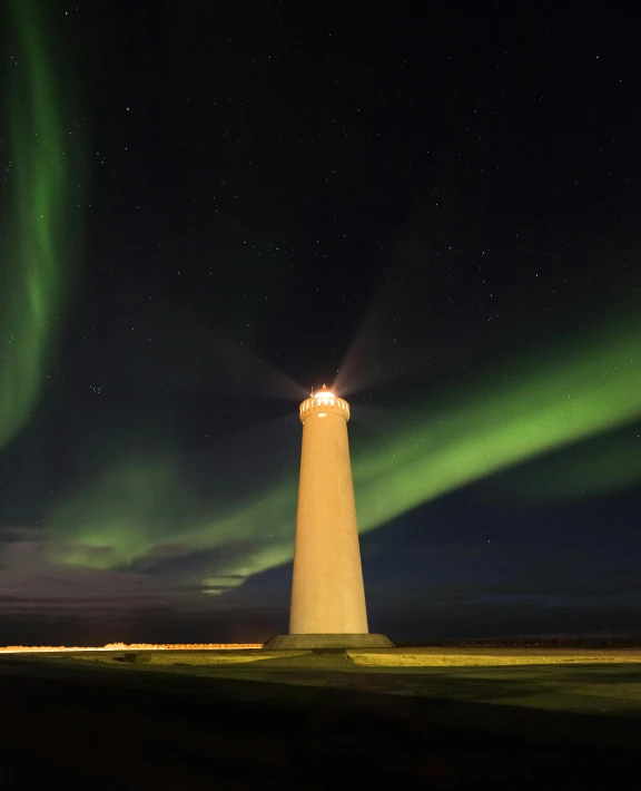 a light house sitting on top of a grass covered field, by Hallsteinn Sigurðsson, pexels contest winner, renaissance, rainbow aurora, triumphant pose, nat geo, album cover