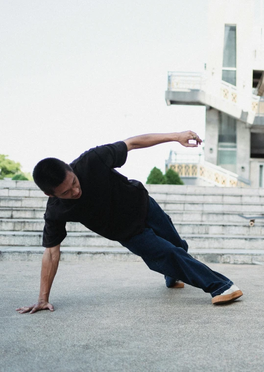 a man in black shirt doing a trick on a skateboard, inspired by Fei Danxu, laying down, t pose, leslie zhang, compassionate