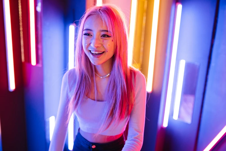 a woman standing in a room with neon lights, pexels contest winner, pink straight hair, pretty smile, pokimane, lulu chen