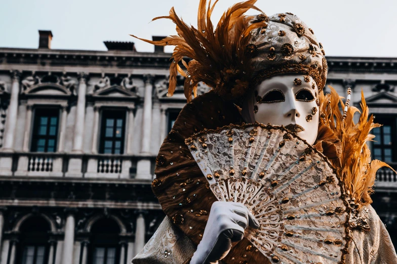 a close up of a person wearing a mask and holding a fan, pexels contest winner, baroque, gondolas, sequins, thumbnail, square