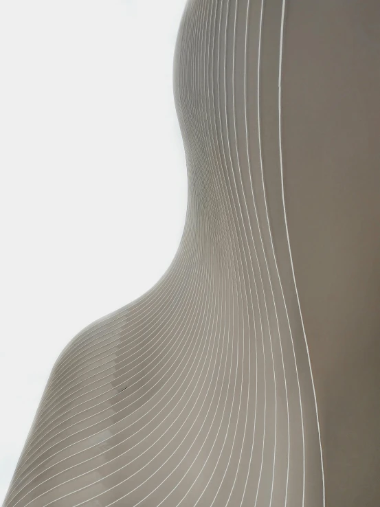 a white vase sitting on top of a table, by Zaha Hadid, muted colored bodysuit, detail shot, detailed product image, 165 cm tall