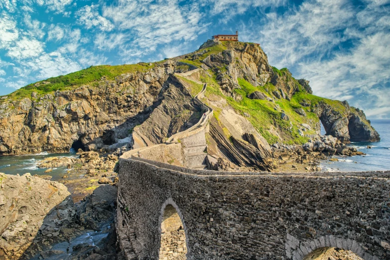 a stone bridge over a body of water, by Carlo Martini, pexels contest winner, renaissance, cinq terre, epic scale ultrawide angle, normandy, thumbnail
