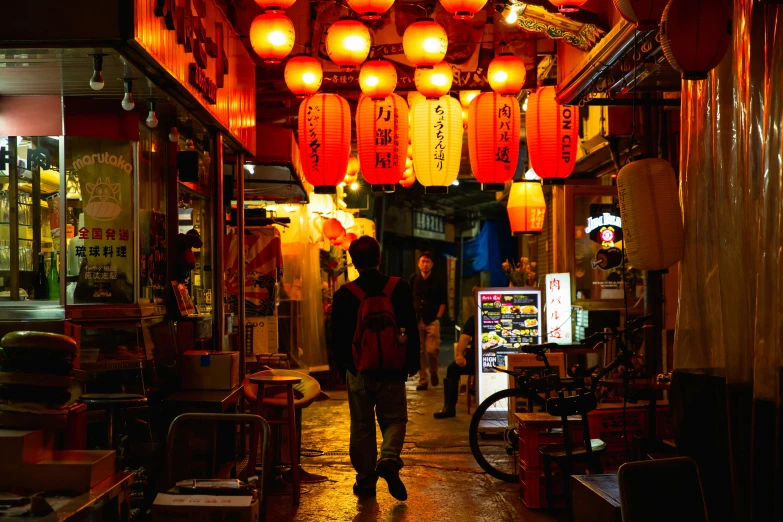 a person walking down a street at night, pexels contest winner, ukiyo-e, red neon lights inside it, hanging lanterns, inside of a tokyo garage, 🦩🪐🐞👩🏻🦳