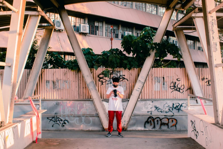 a man taking a picture of himself on his cell phone, pexels contest winner, graffiti, red trusses, chappie in an adidas track suit, an young urban explorer woman, faded glow