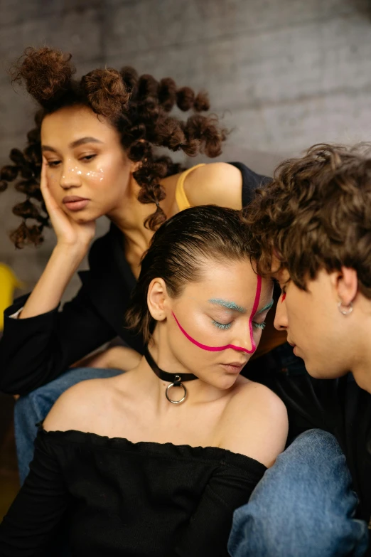 a group of young people sitting on top of a couch, an album cover, by Jan Tengnagel, trending on pexels, renaissance, facepaint facepaint facepaint, sleepy fashion model face, making out, hair