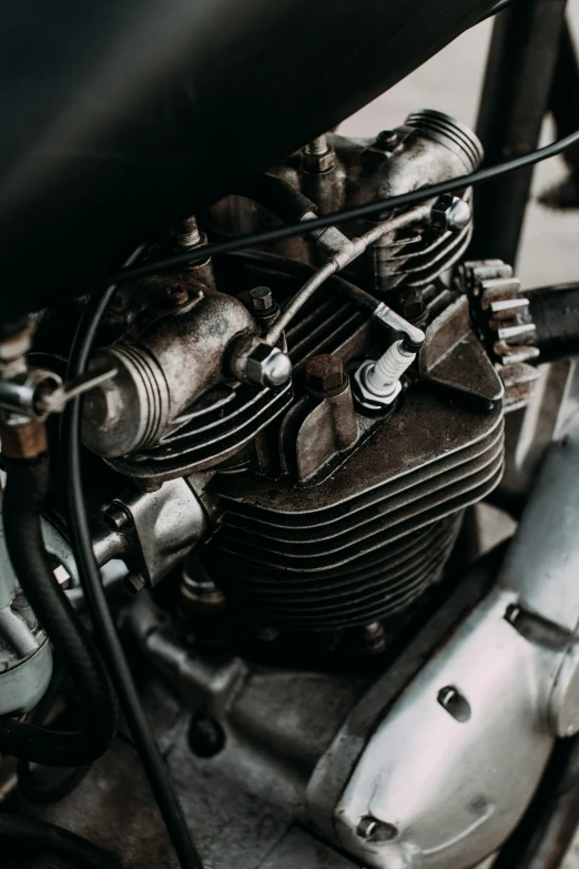a close up view of a motorcycle engine, by IAN SPRIGGS, pexels contest winner, vintage car, minimal shading, triumph, oil lines