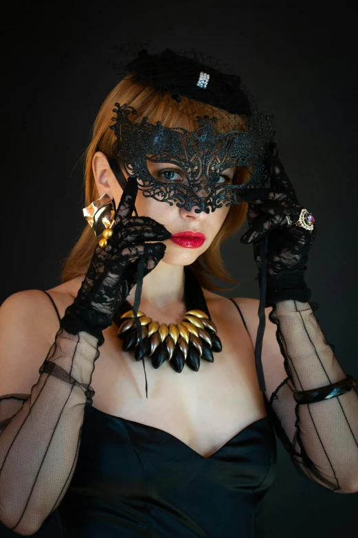 a woman wearing a black mask and gloves, inspired by Hedi Xandt, baroque, better known as amouranth, gold jewlery, lace web, large)}]