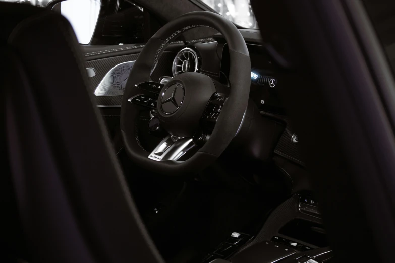 a close up of a steering wheel in a car, a 3D render, by Daniel Seghers, unsplash, photorealism, mercedez benz, pitch black room, highly detailed interior, full view of a sport car