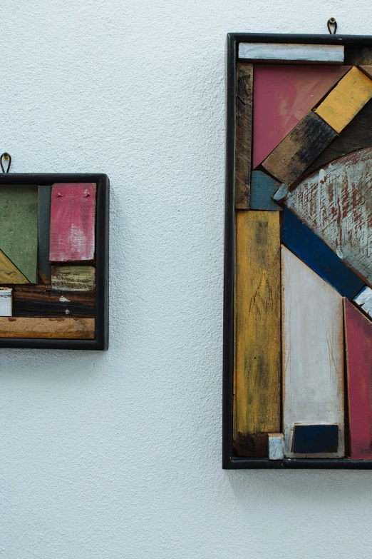 a couple of pieces of art hanging on a wall, inspired by Kurt Schwitters, assemblage, 4k), rustic, kreuzberg, square