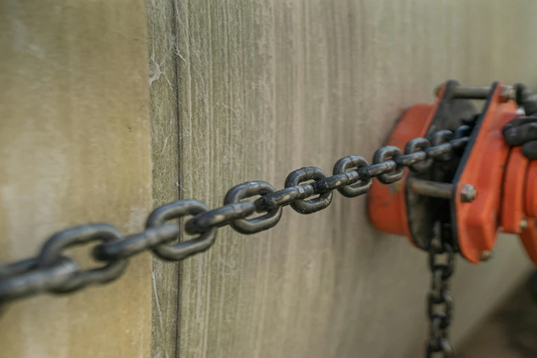 a close up of a chain attached to a wall, by Jay Hambidge, unsplash, paul barson, cottage close up, modeled, 4 k detail