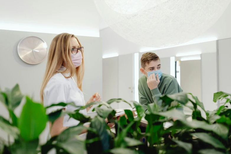 a couple of people in a room with plants, profile image, dentist, kacper niepokolczycki, avatar image