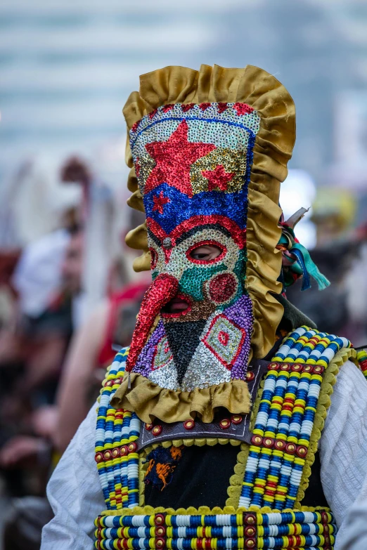 a close up of a person wearing a costume, inspired by Bernd Fasching, renaissance, carnaval de barranquilla, while tripping on dmt, the oracle of the mayan elders, masks