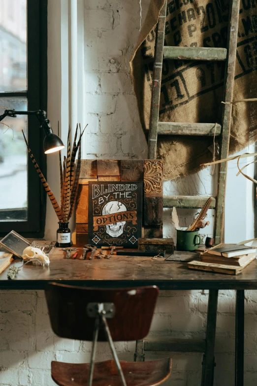 a wooden desk topped with a lamp next to a window, trending on pexels, arts and crafts movement, flaming torches and pitchforks, feathers and paint, advertising photo, dwell