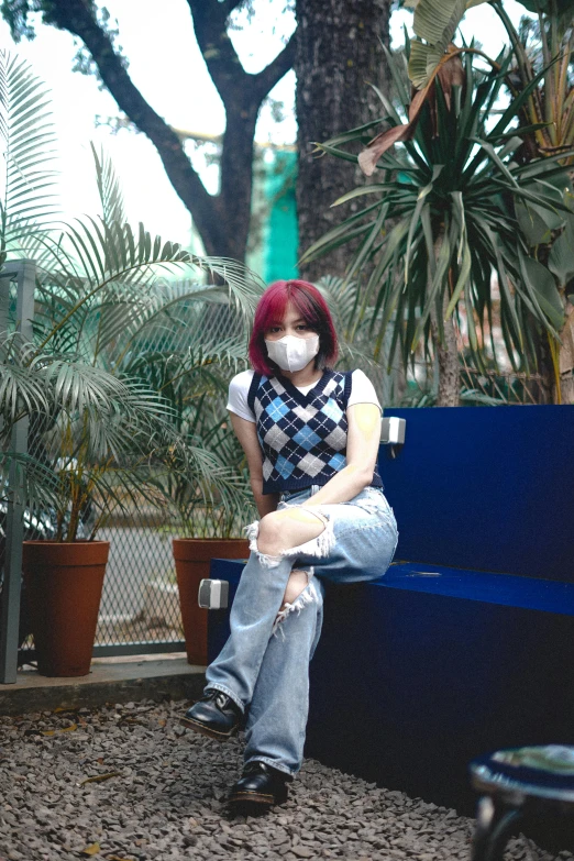 a woman with red hair sitting on a blue bench, inspired by Leng Mei, unsplash, y 2 k cutecore clowncore, wearing mask, wearing casual clothing, fullbody photo