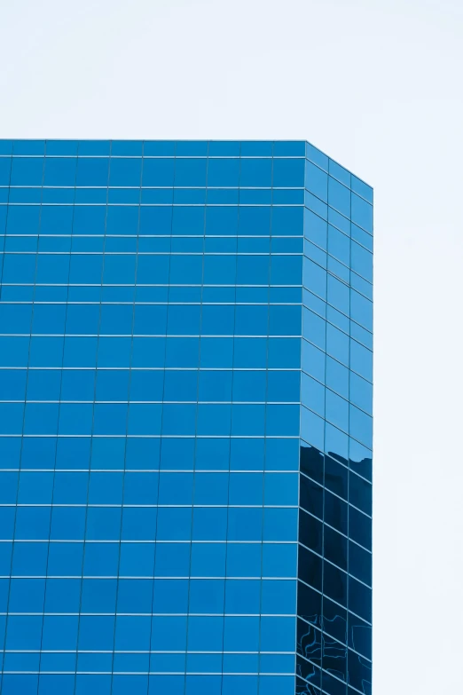 a plane is flying in front of a blue building, by Dave Melvin, minimalism, glass reflections on top, square, ((sharp focus)), cascading highrise