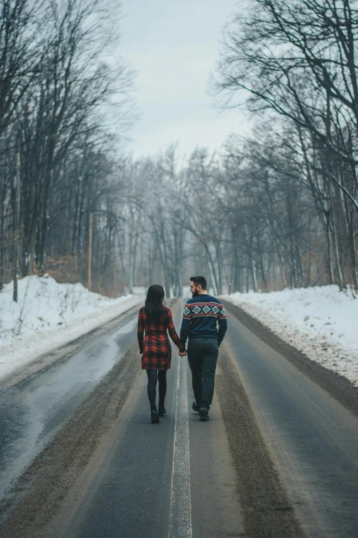 two people walking down a snowy road holding hands, pexels contest winner, romanticism, handsome, queen, college, van