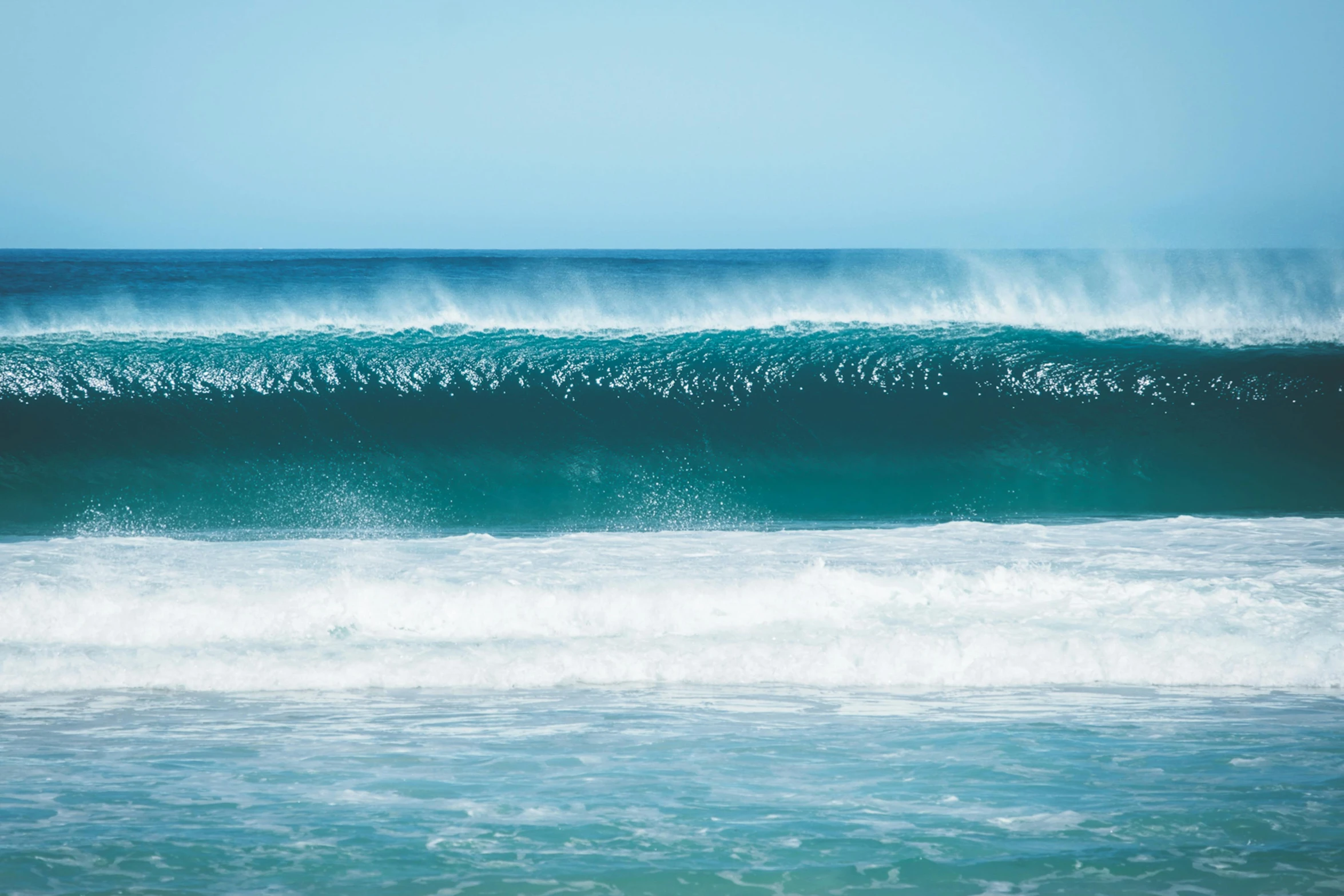 a man riding a wave on top of a surfboard, pexels contest winner, renaissance, turquoise, lined up horizontally, o'neill cylinder, australian beach