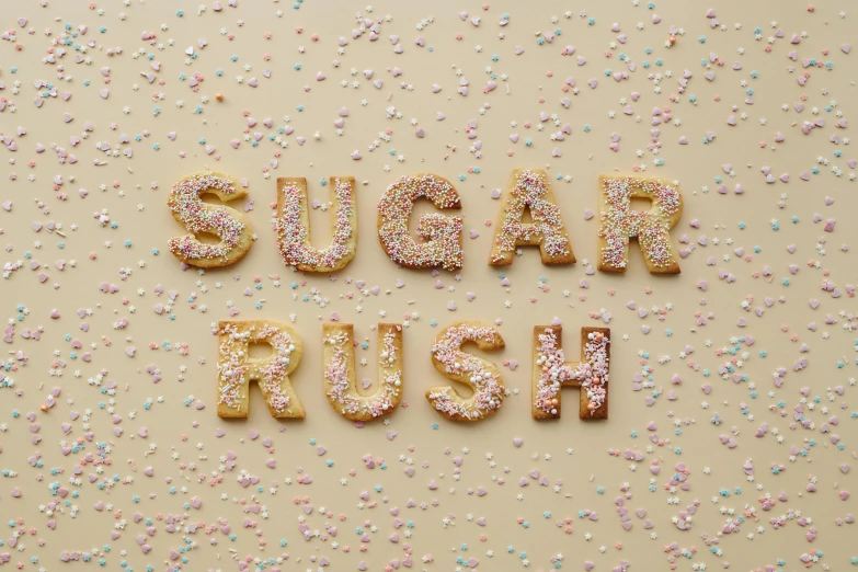 a sign that says sugar rush surrounded by sprinkles, by Sylvia Wishart, ffffound, close up food photography, riding, blush