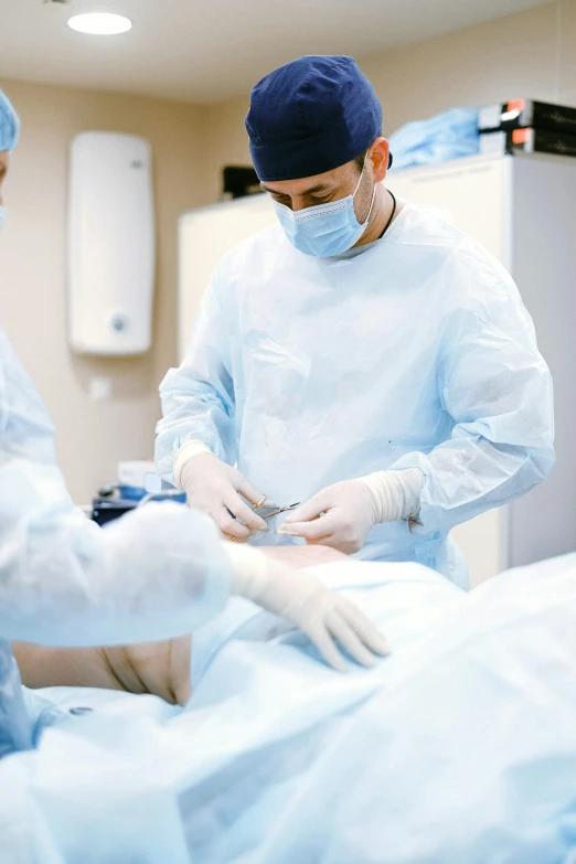 a group of surgeons working on a patient, instagram, happening, waist - up, thumbnail, uncropped, surgical supplies